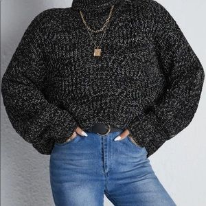 New black turtleneck sweater